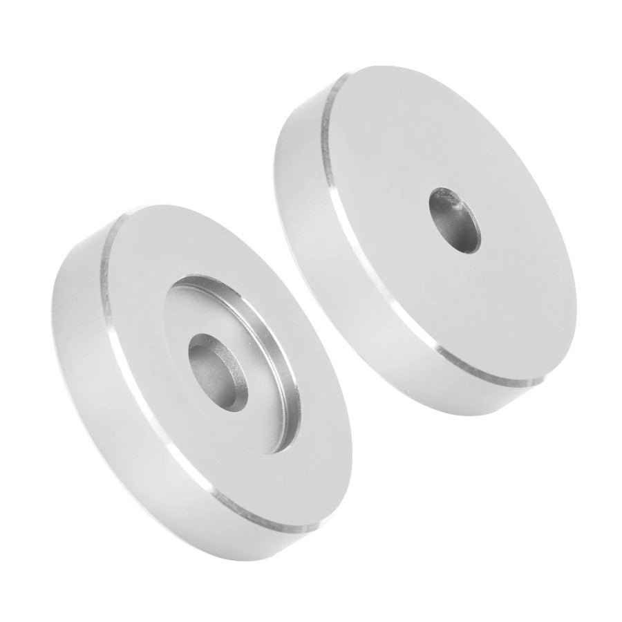 A round metallic silver aluminium 45rpm adaptor with a central hole, shown on a plain white background side by side. - Laurel Canyon Vinyl
