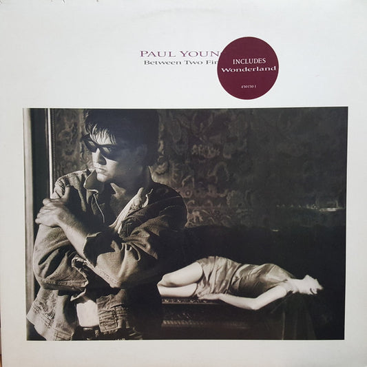 Paul Young - Between Two Fires